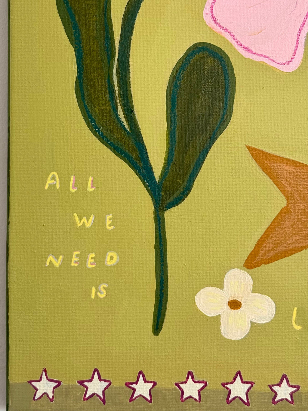 All We Need Is Love - close up of pink flower and small white daisy